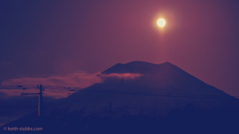 The moon rising over Mount Yotei, in Niseko